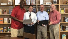 Charles Haley joins Electronic Access Foundation and One Main Financial at Tackle Tomorrow event with Bob Bowie.