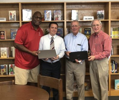 Charles Haley joins Electronic Access Foundation and One Main Financial at Tackle Tomorrow event with Bob Bowie.